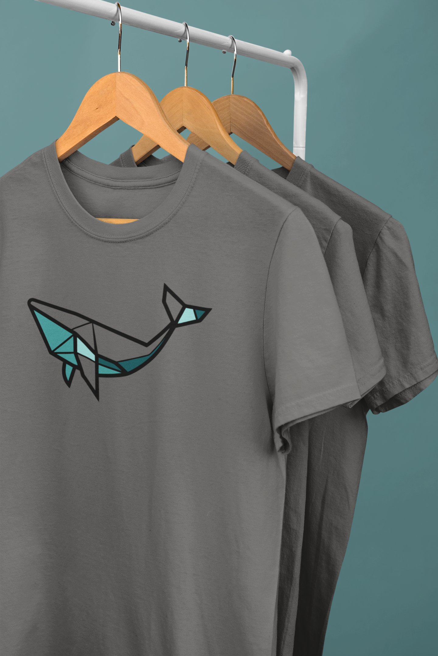 Close-up of geometric whale logo, screen printed on organic cotton.