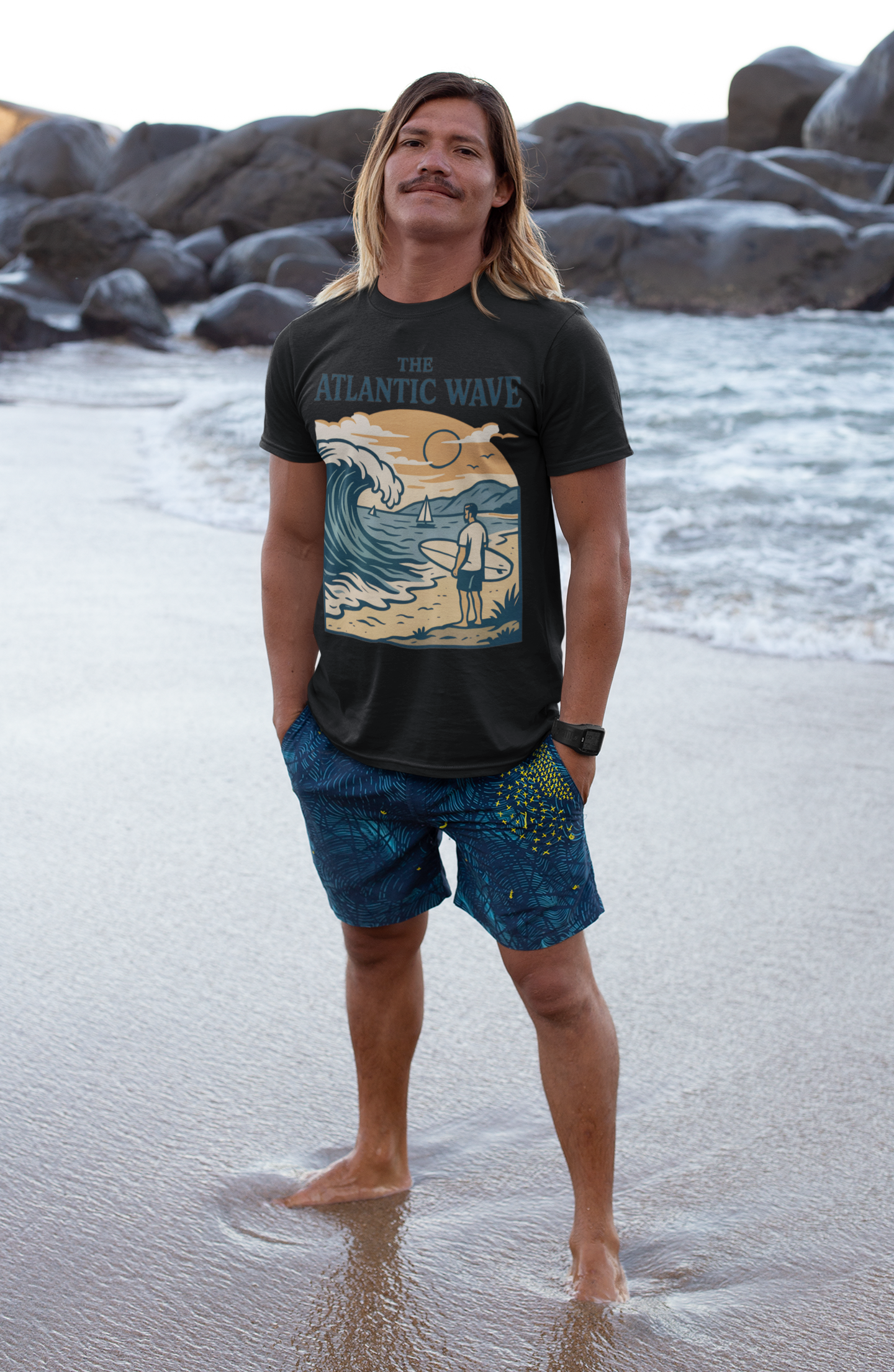 Model wearing the shirt in a coastal setting.