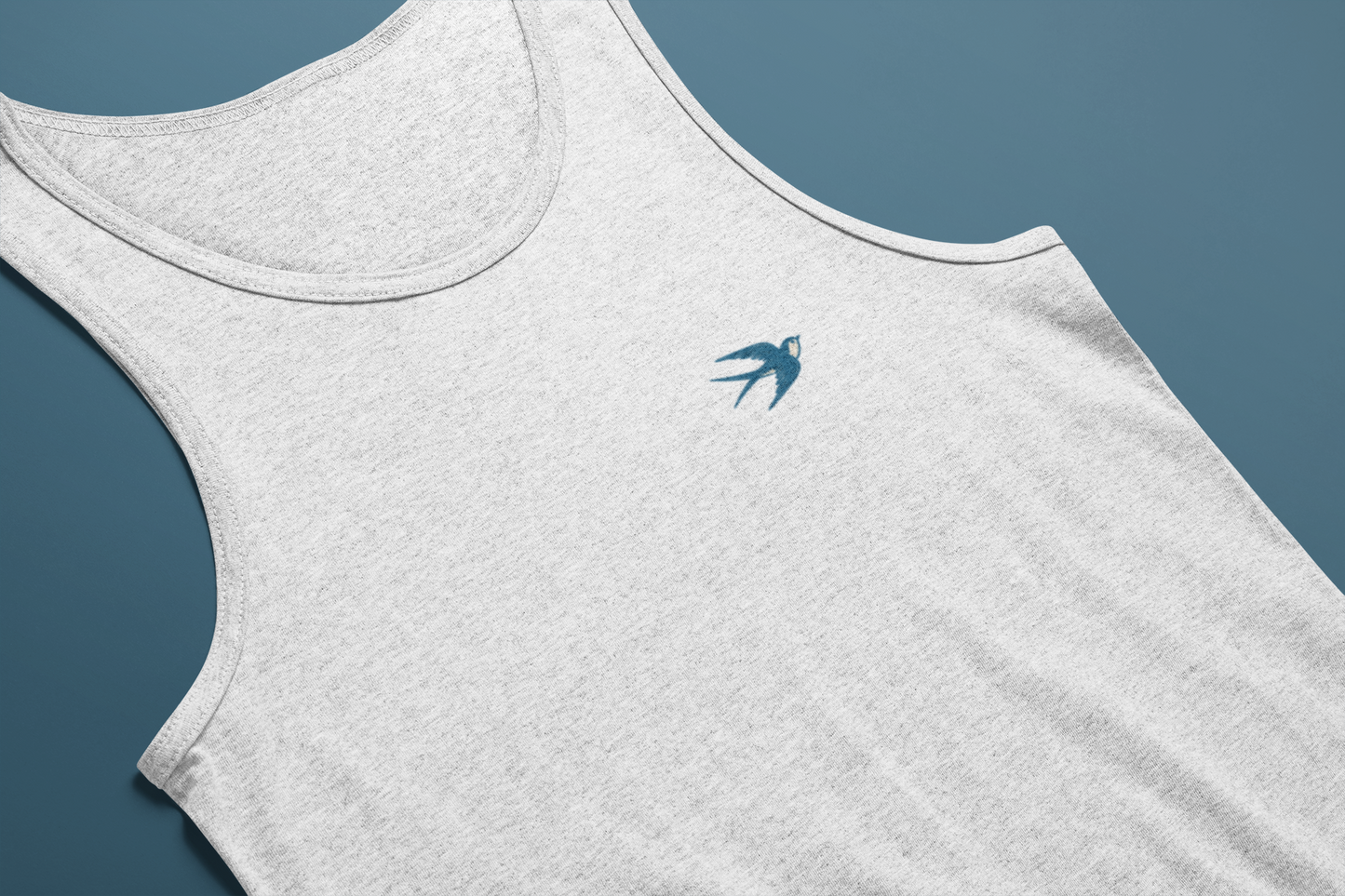 White tank top for men with subtle Portuguese symbol.