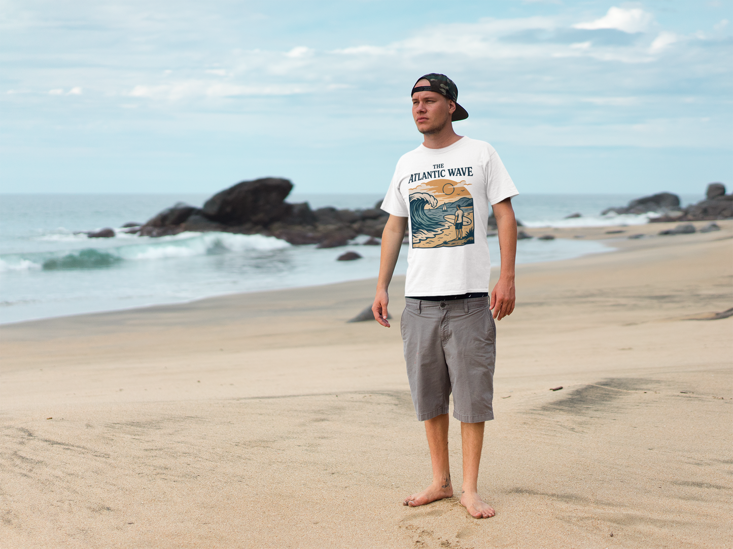 Folded shirt showing large bold surf design.
