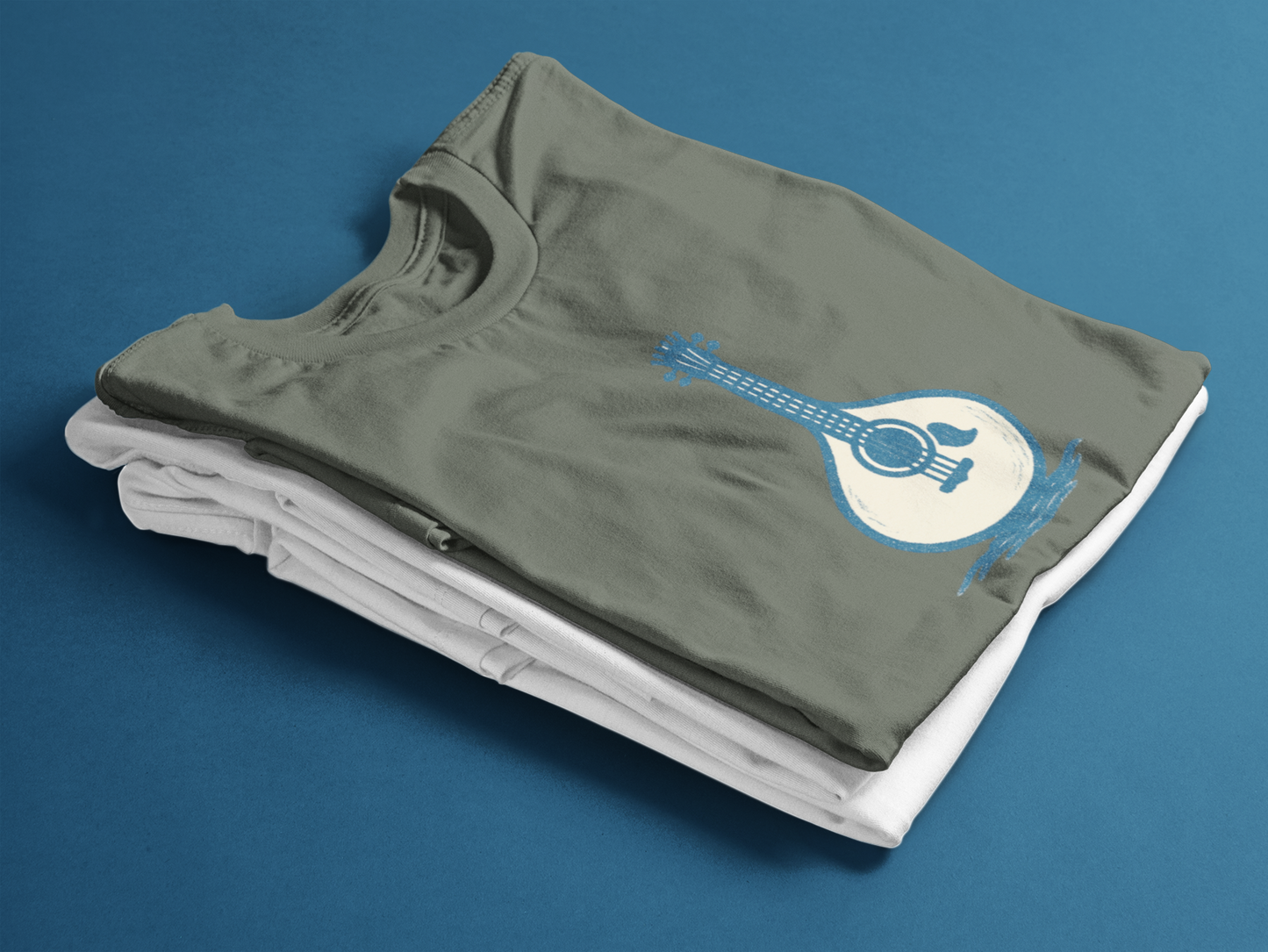 Unisex organic cotton t-shirt with minimal Fado guitar logo.