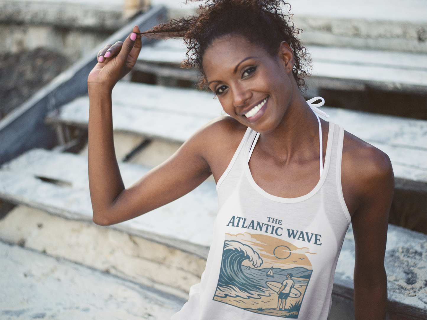Front view of women’s tank top featuring a minimalist surfboard design.
