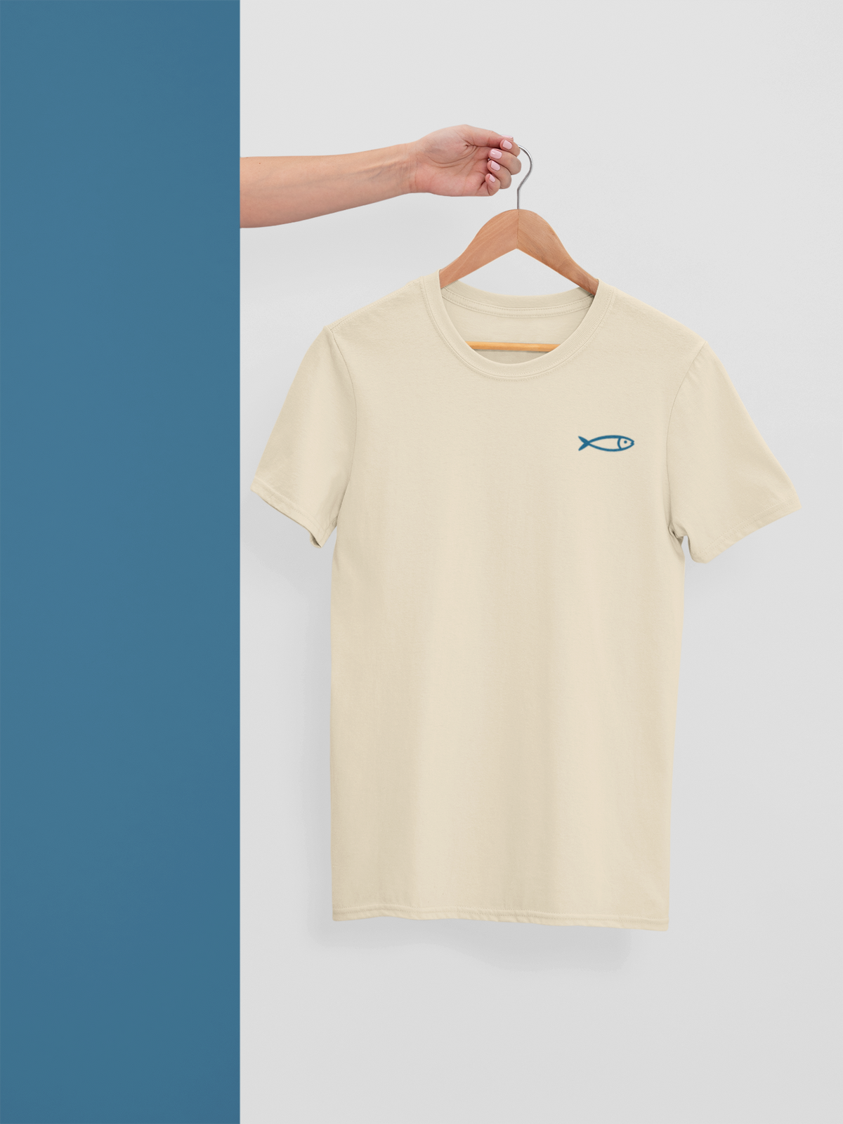 Cream organic cotton crew neck t-shirt with minimalist blue sardine graphic, eco-friendly gift from Portugal.