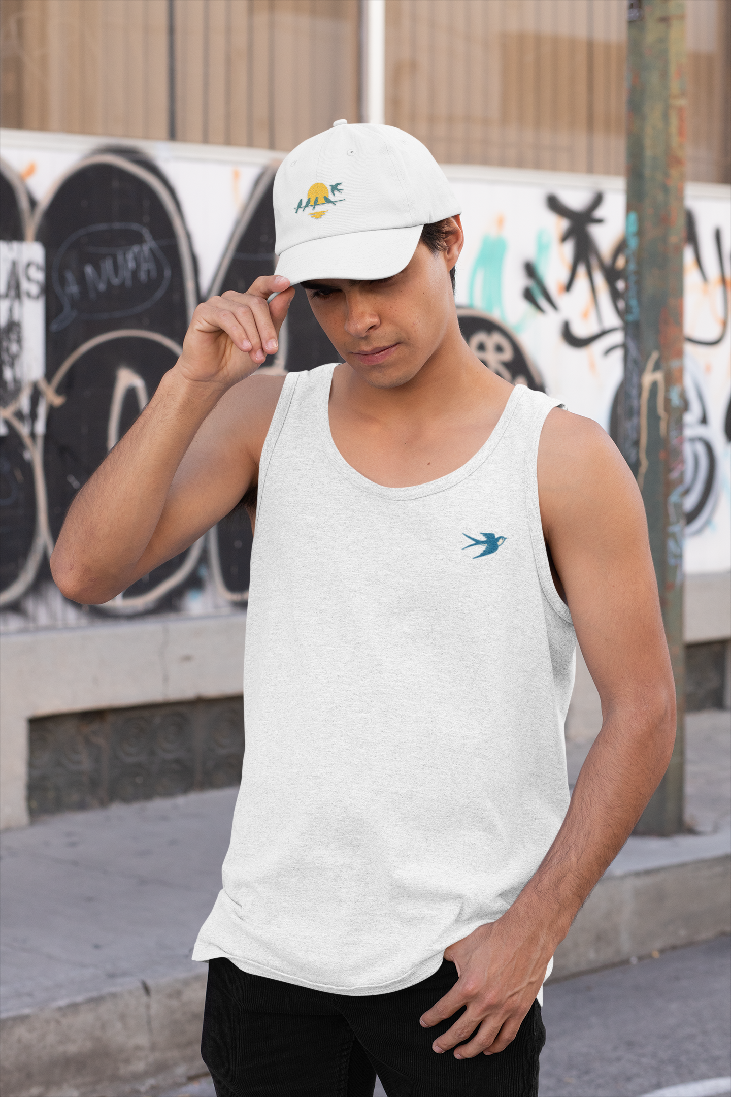 Swallow design on minimalist sleeveless shirt.