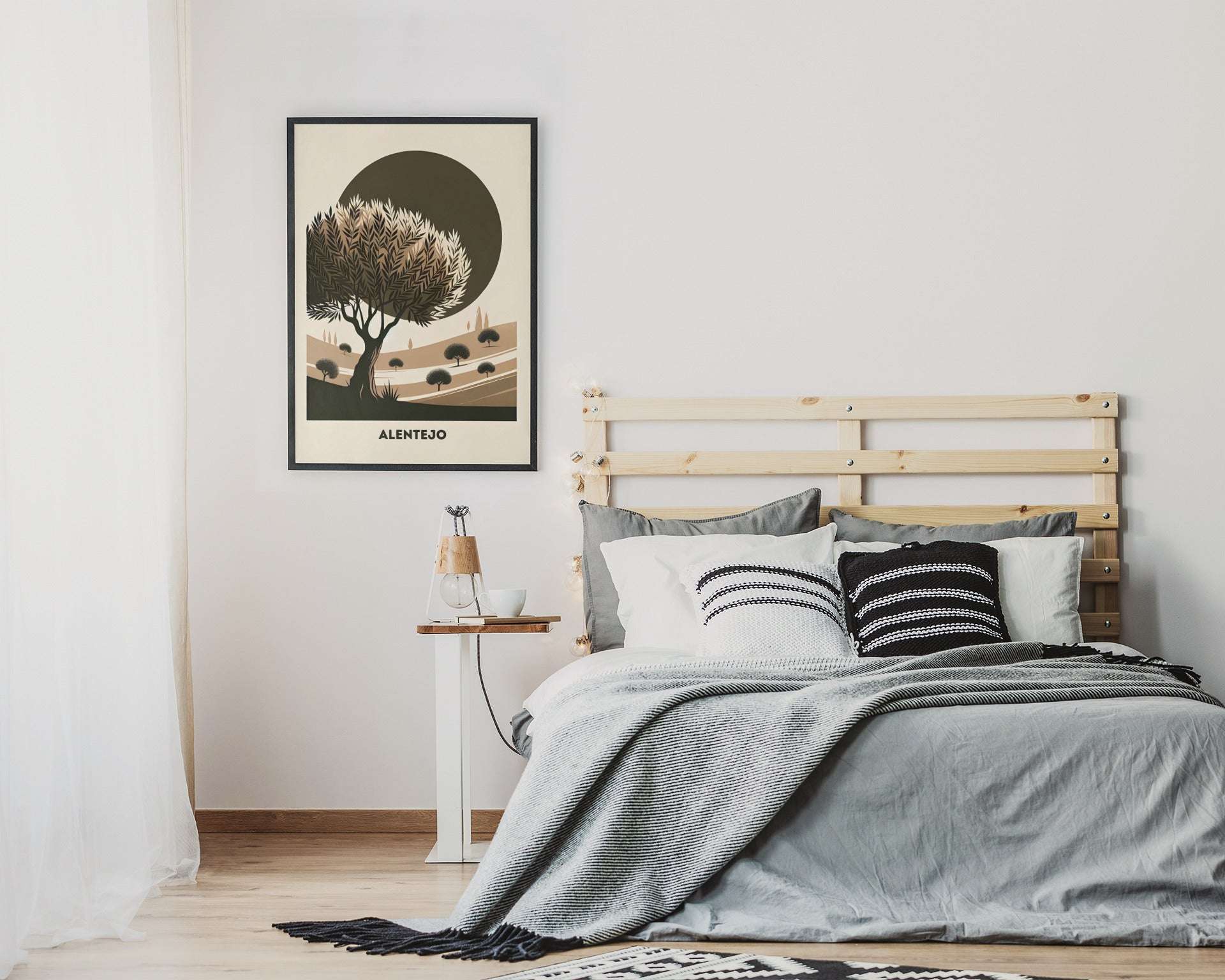Alentejo Cork Tree Printed Poster in a black frame hanging above a bed. A serene and minimalist decor piece for bedroom interiors.