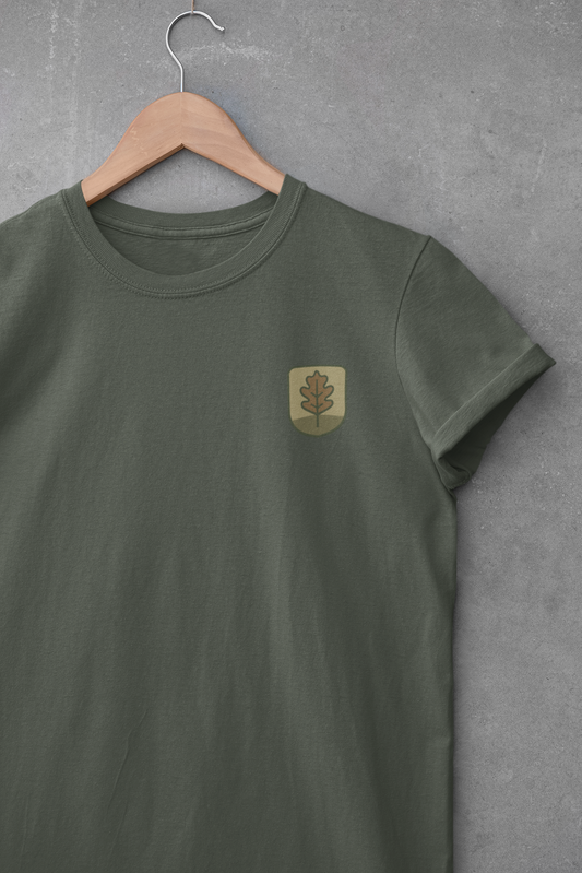 Line-art oak leaf logo printed on chest of white shirt.