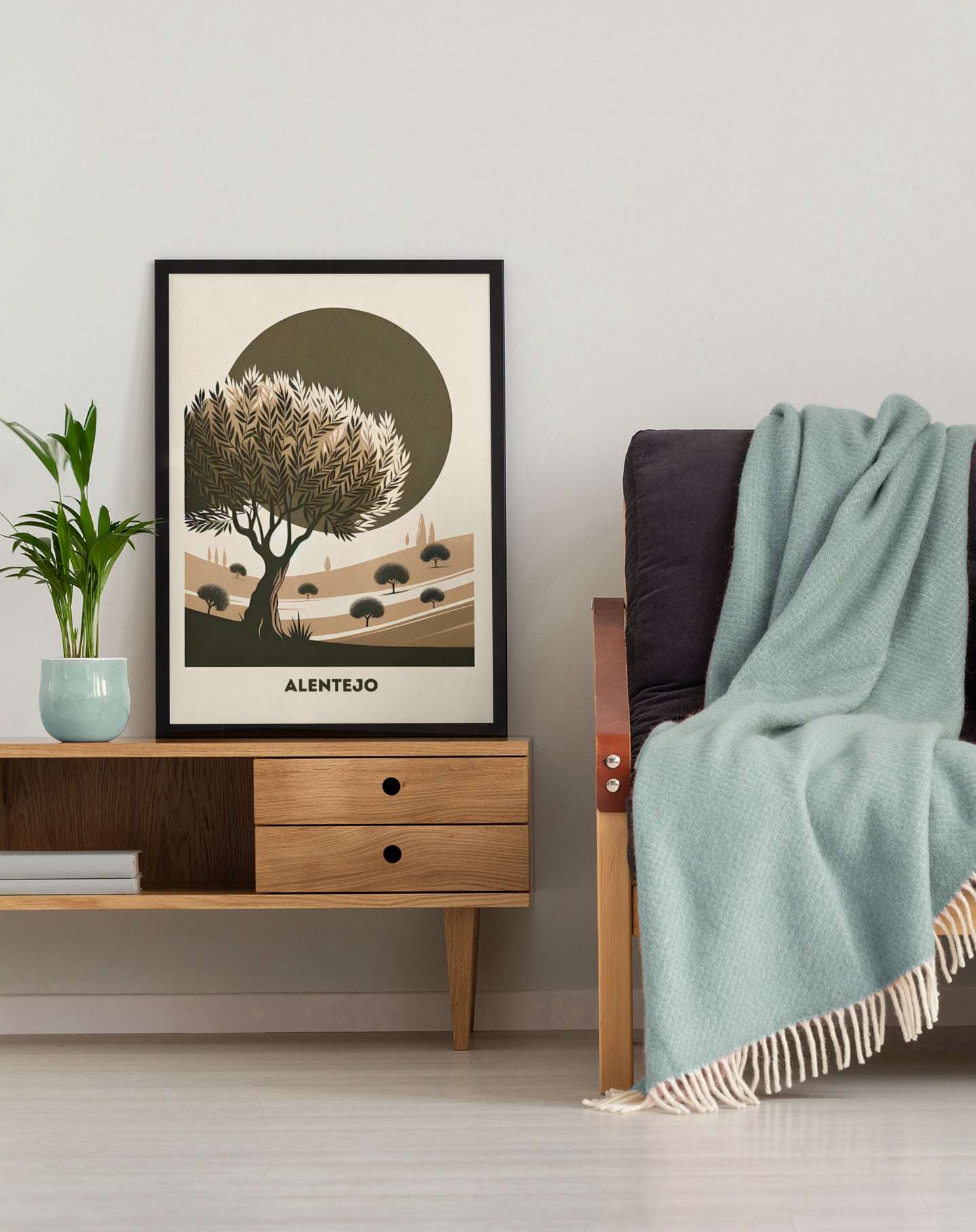 Framed Alentejo Cork Tree Printed Poster leaning against a wall on a wooden cabinet. A stylish and rustic artwork for modern interiors.