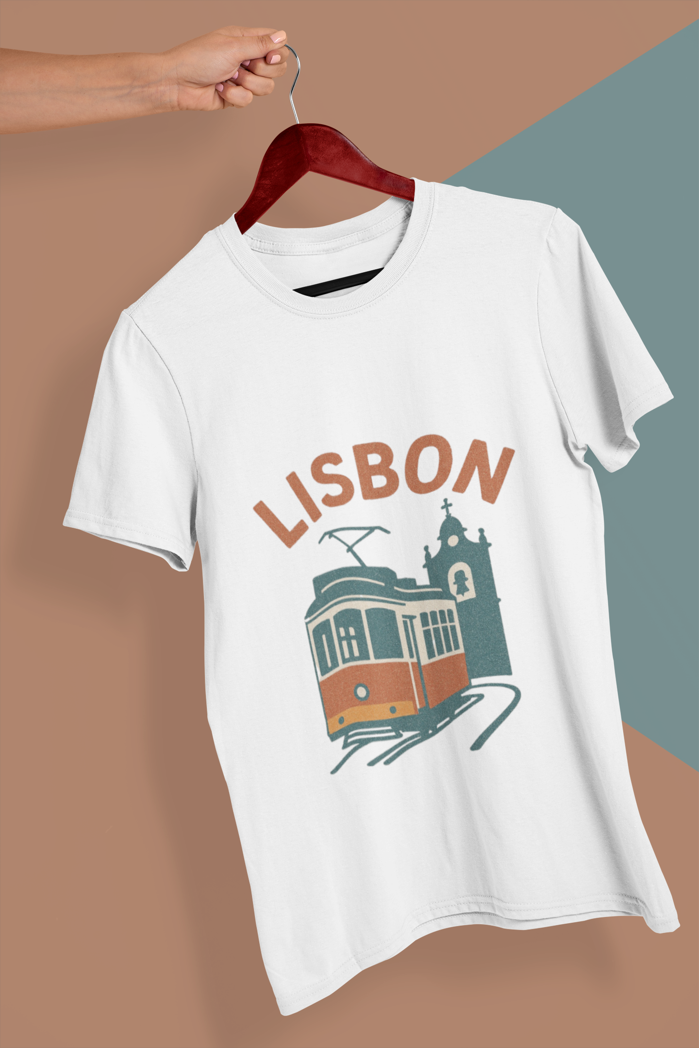Folded Alfama tee with faded retro print.