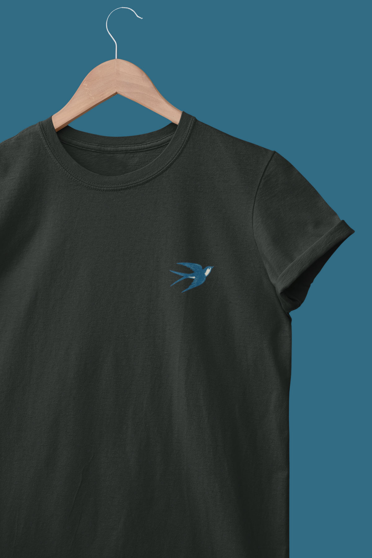 Minimal swallow shirt for everyday and cultural style.