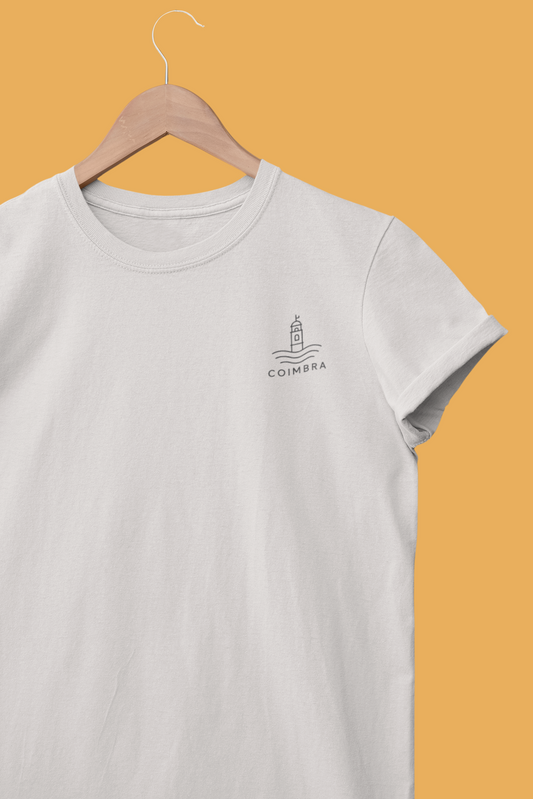 Gray t-shirt with a logo on a hanger against an orange background