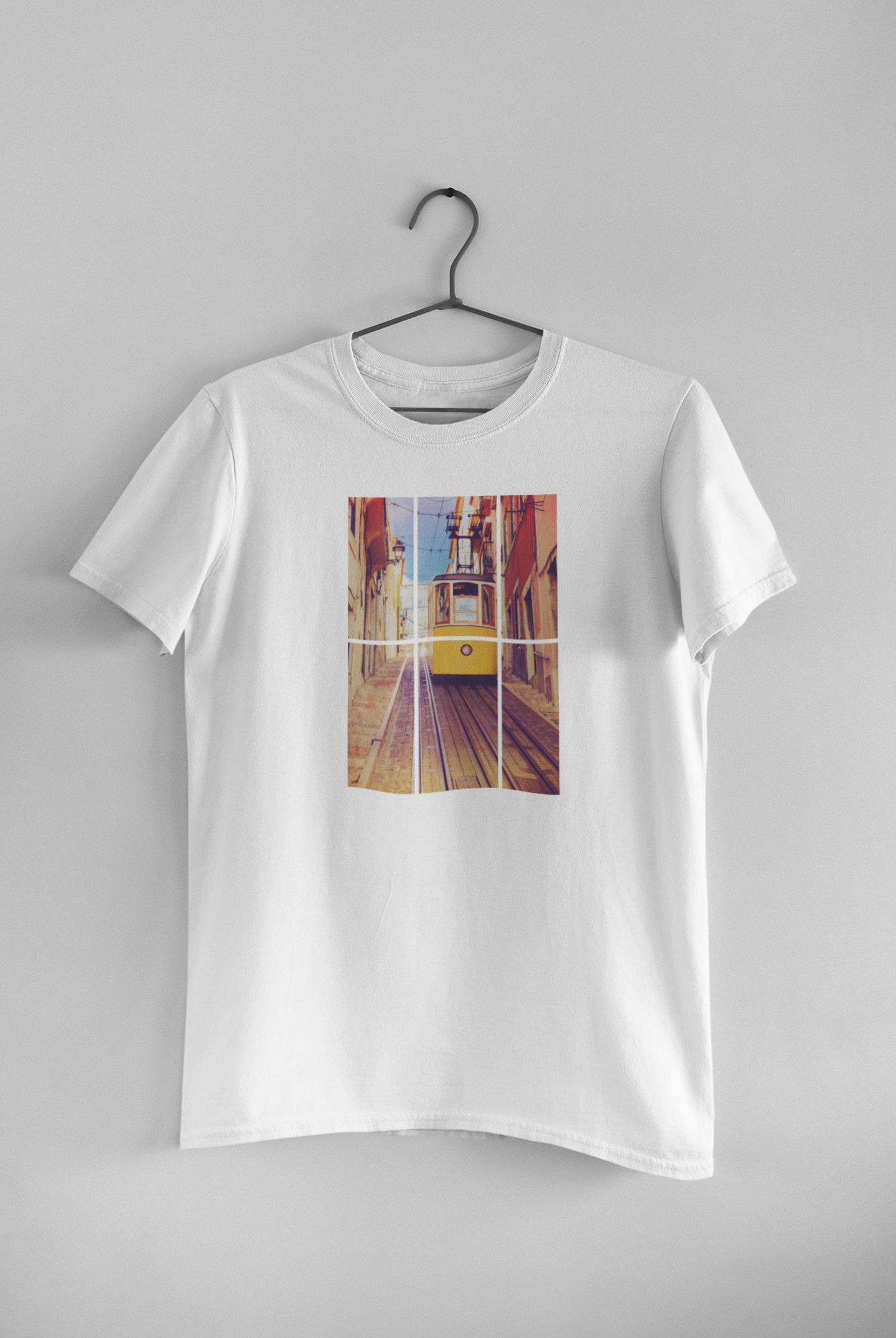 Lisbon Tram T-shirt displayed on a hanger, showcasing the iconic yellow tram design. Made from organic and eco-friendly fabric for a sustainable wardrobe.