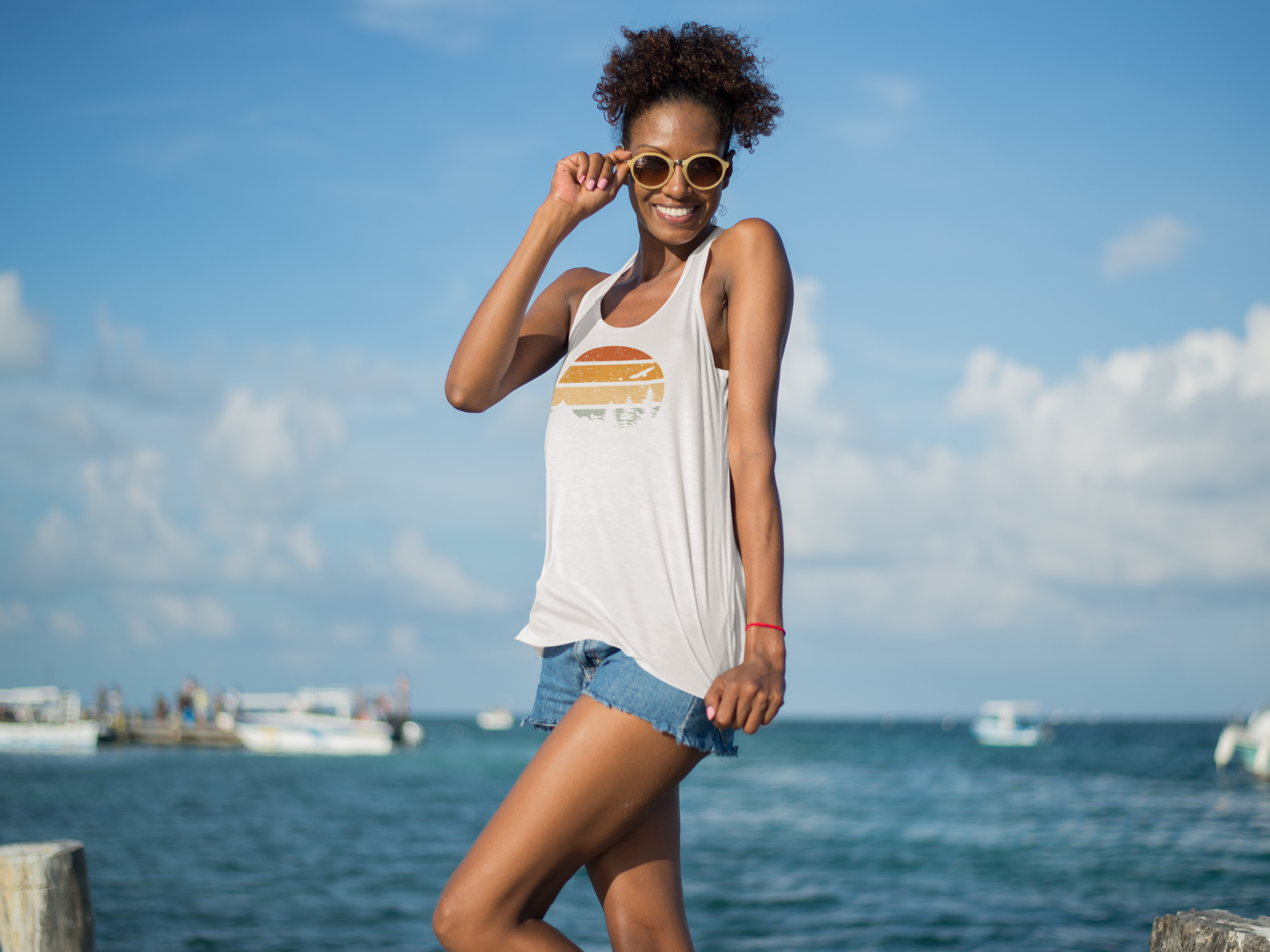 Women's white Madeira Vintage Tank Top with a retro sunset print. Lightweight organic cotton, ideal for beach vacations and casual wear.