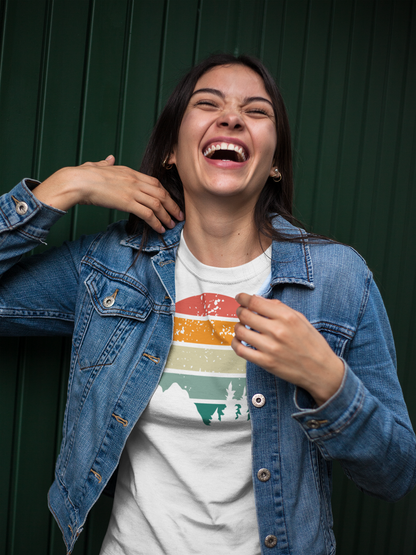 Laughing woman in a white Madeira Mountains Retro Organic Vintage T-Shirt and denim jacket. A stylish and comfortable hiking tee.