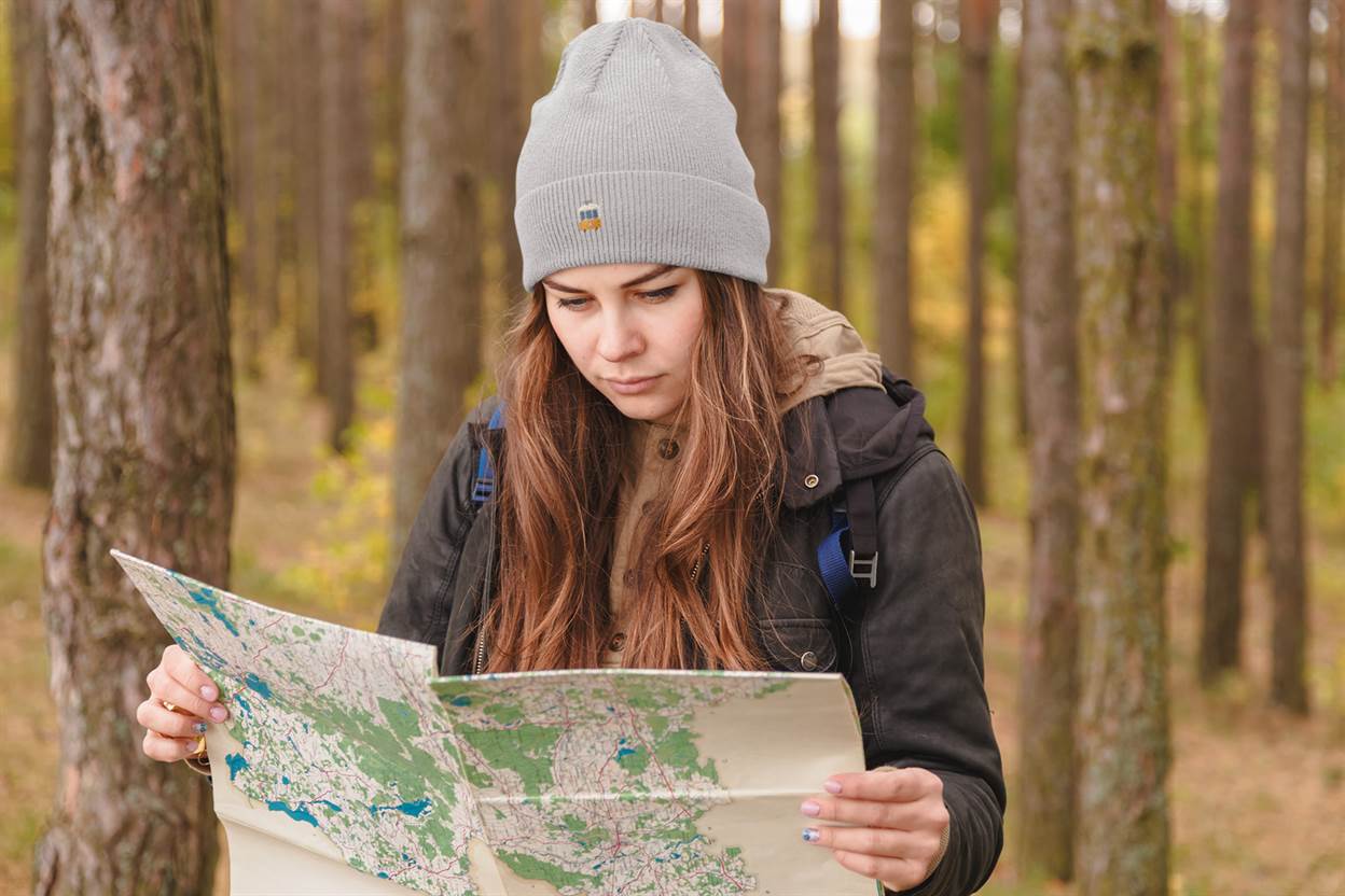 Light gray Lisbon Electrico Beanie with embroidered tram, perfect for outdoor exploration. A warm and stylish unisex turbo acrylic hat.