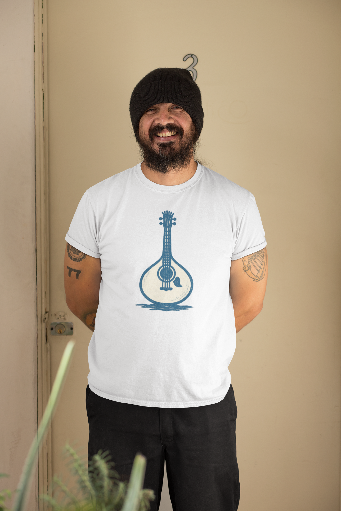 Relaxed fit unisex t-shirt with modern guitar graphic.