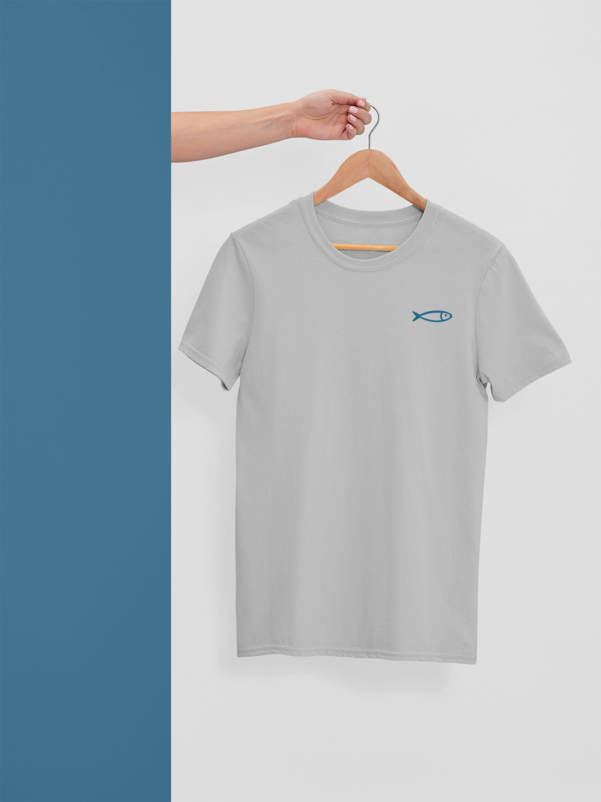 Light grey organic cotton crew neck t-shirt with small blue minimalist sardine graphic, eco-friendly gift from Portugal.