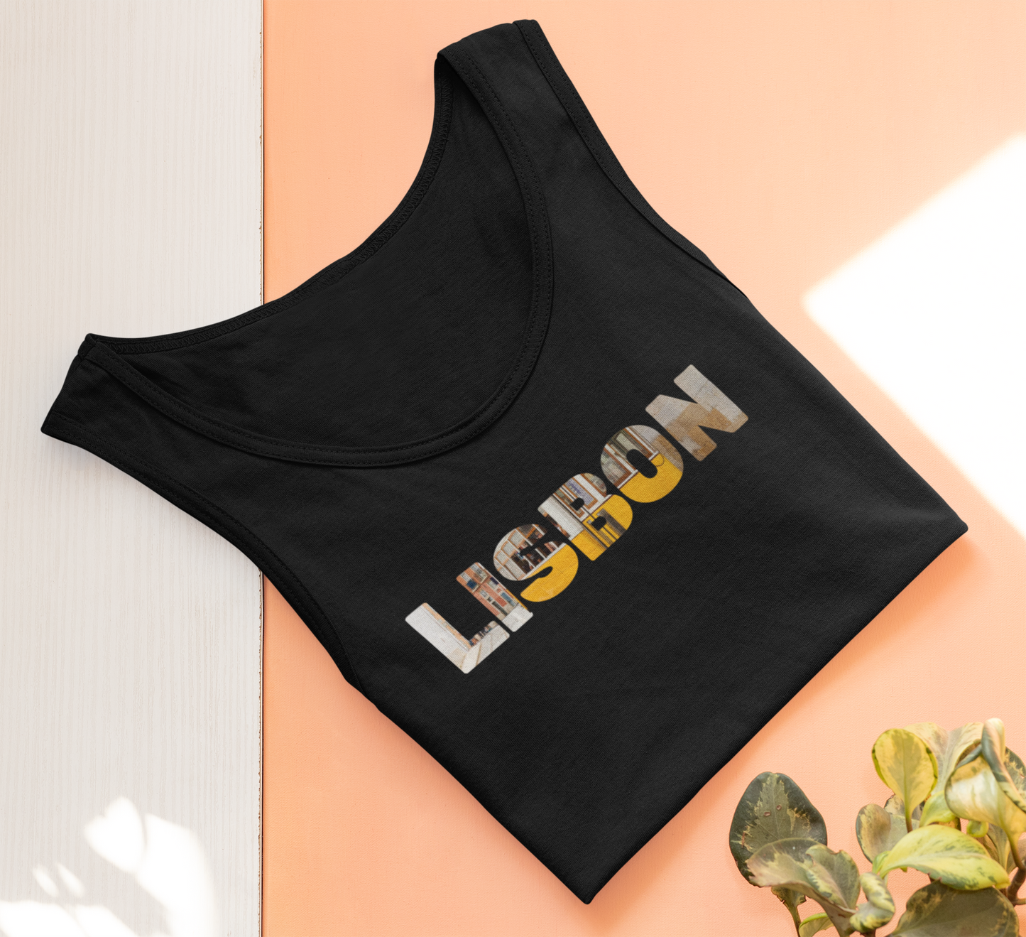 Side view of the Customizable Letter Colors Lisbon Organic Tank Top, showcasing its feminine fit.