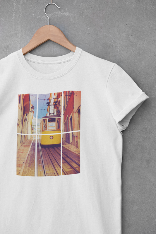 White Lisbon Tram T-shirt with a large print of the iconic yellow tram on a hanger. Eco-friendly and organic cotton fabric for a sustainable choice.