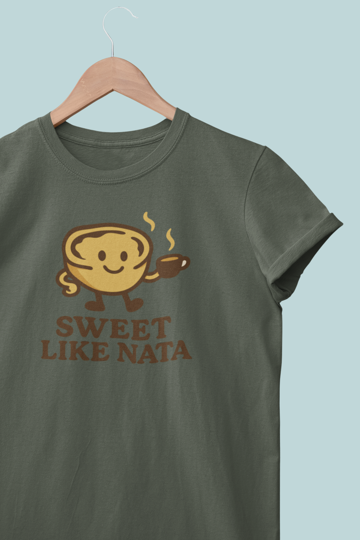 Woman smiling in cute Portuguese-themed dessert t-shirt.