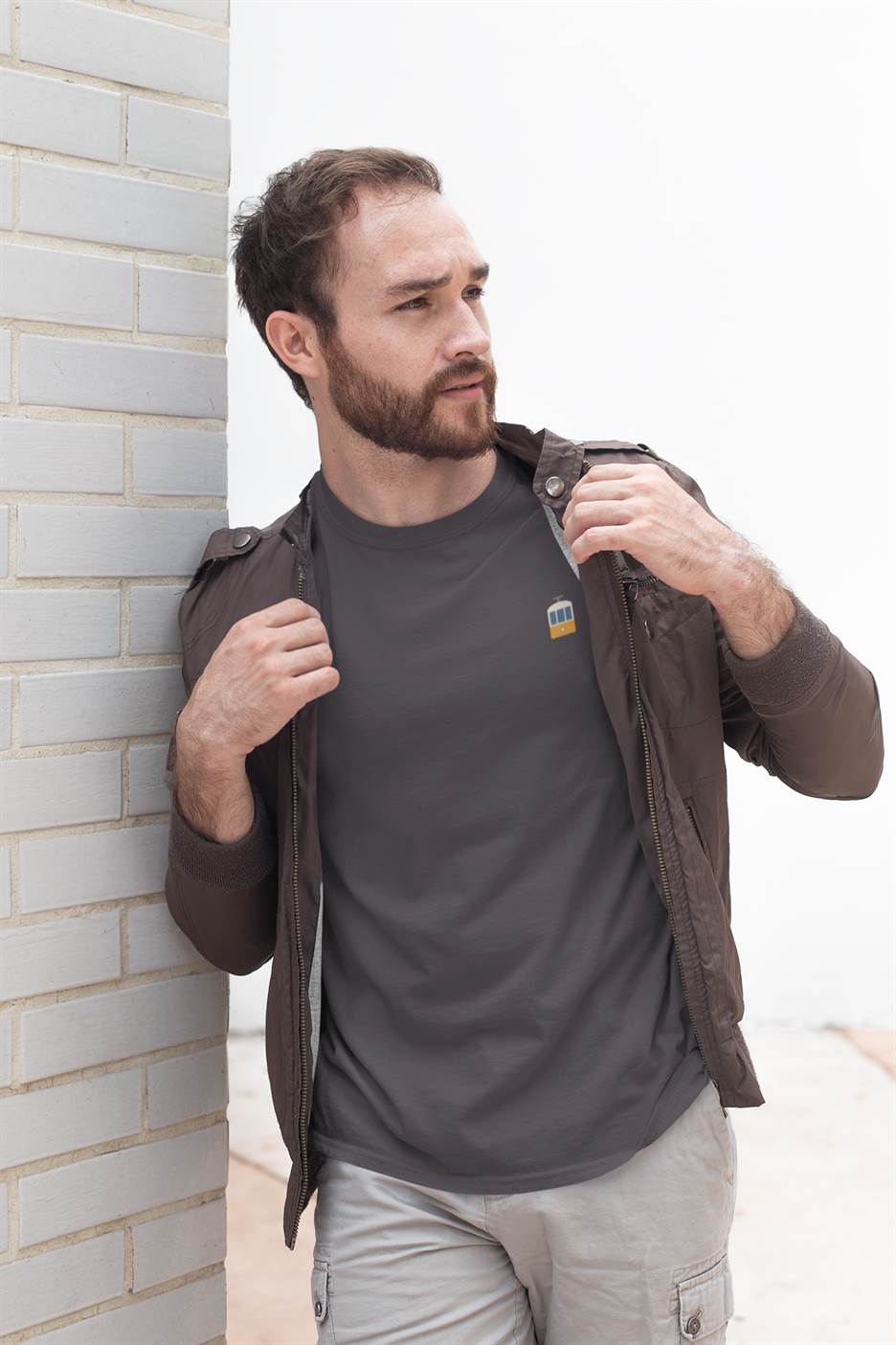 Dark gray organic cotton t-shirt with Lisbon's Electrico tram embroidery. A minimalist and sustainable fashion choice for men.