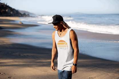 Unisex white Madeira Vintage Tank Top with a retro sunset print. Organic cotton fabric ensures comfort for hiking, surfing, and casual wear.