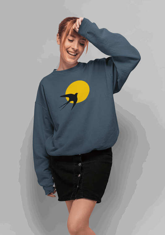 Unisex organic sweater in deep blue with a minimal Andorinha swallow logo against a yellow sun, made from soft organic cotton for eco-friendly fashion.