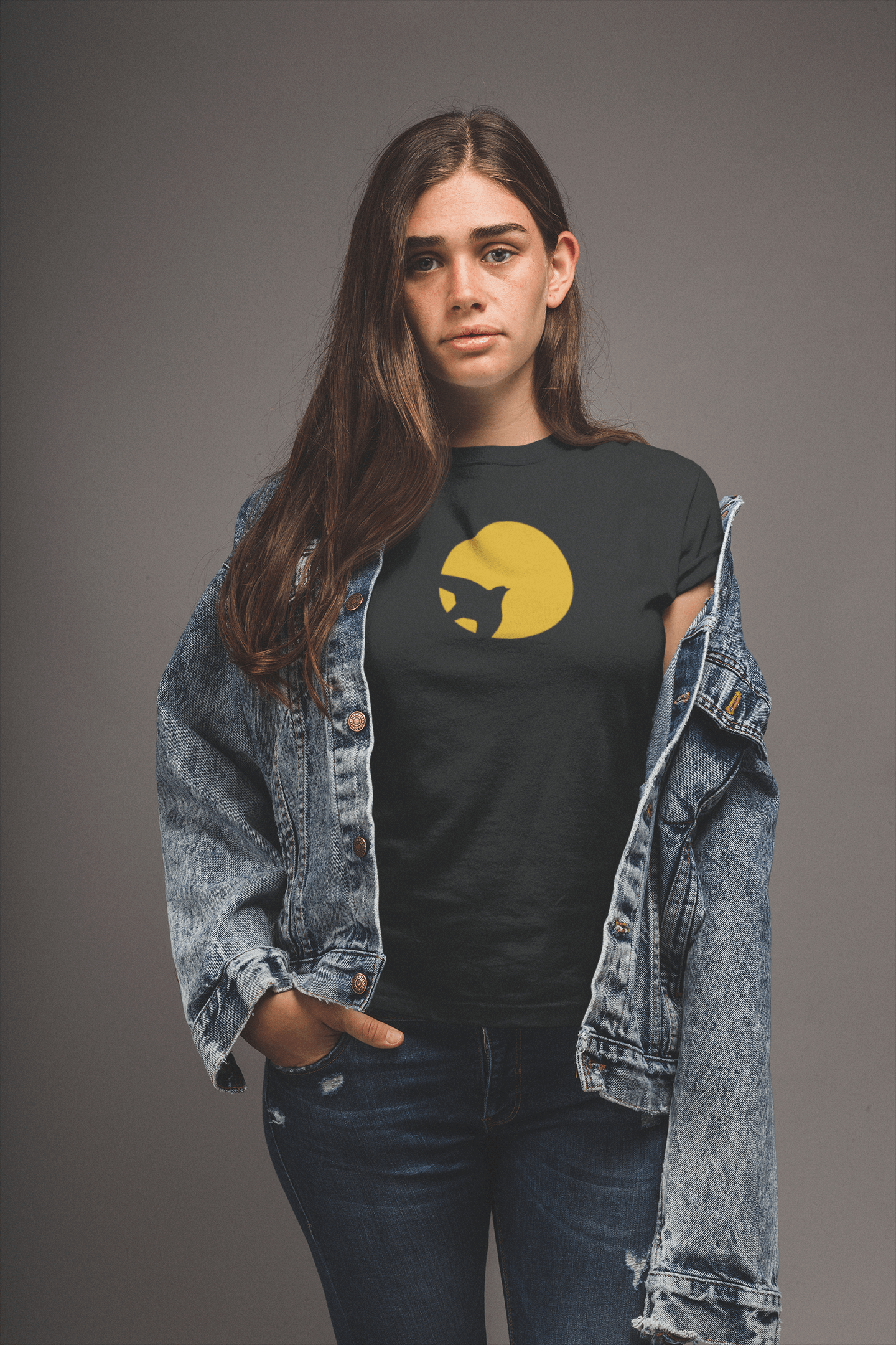 Black unisex t-shirt featuring a unique cat and sun design, blending artistic style with comfort. Made from organic cotton for a sustainable fashion choice.