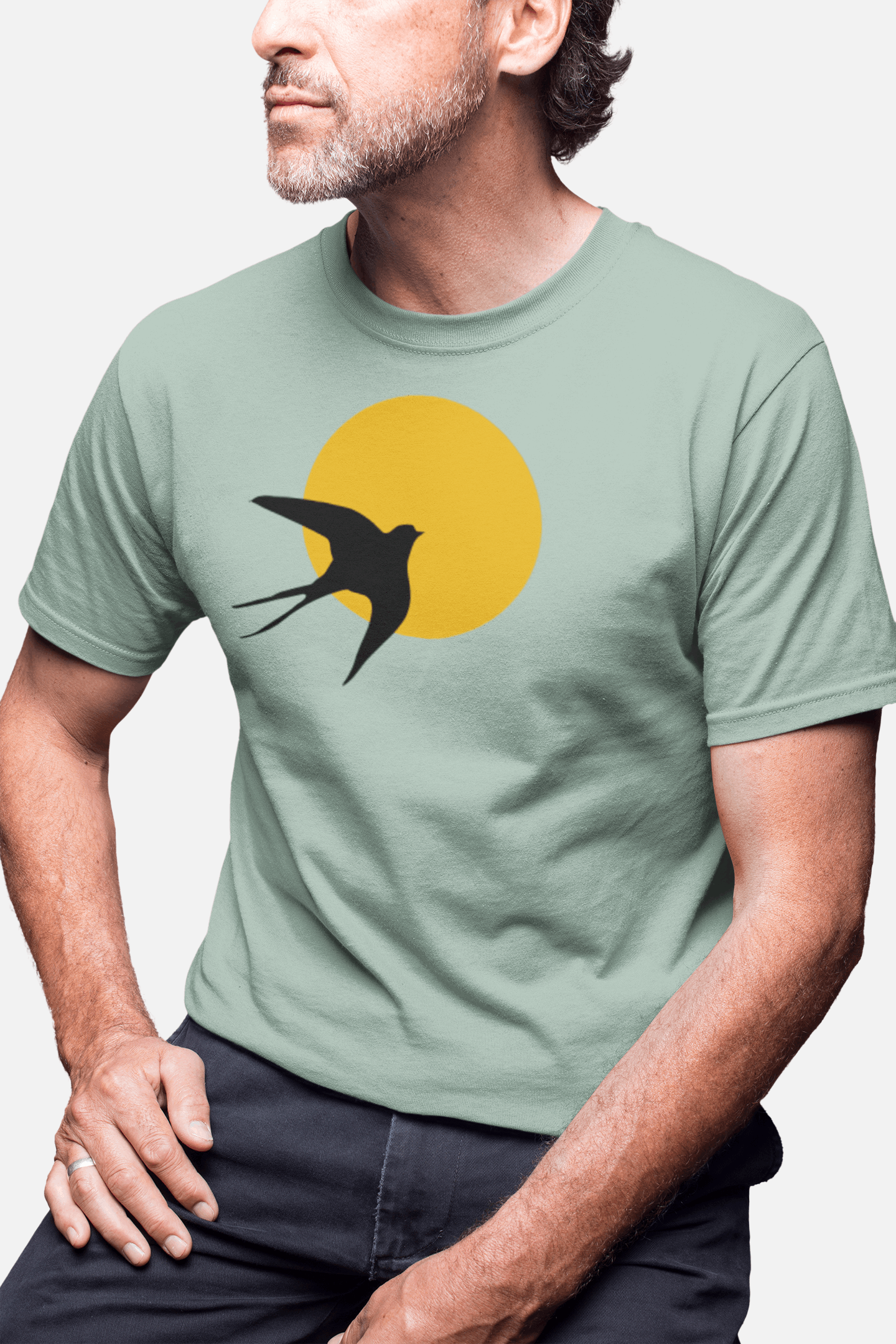 Sustainable unisex t-shirt with a striking Andorinha swallow and sun design. Crafted from organic cotton, celebrating Portuguese heritage in eco-friendly fashion.