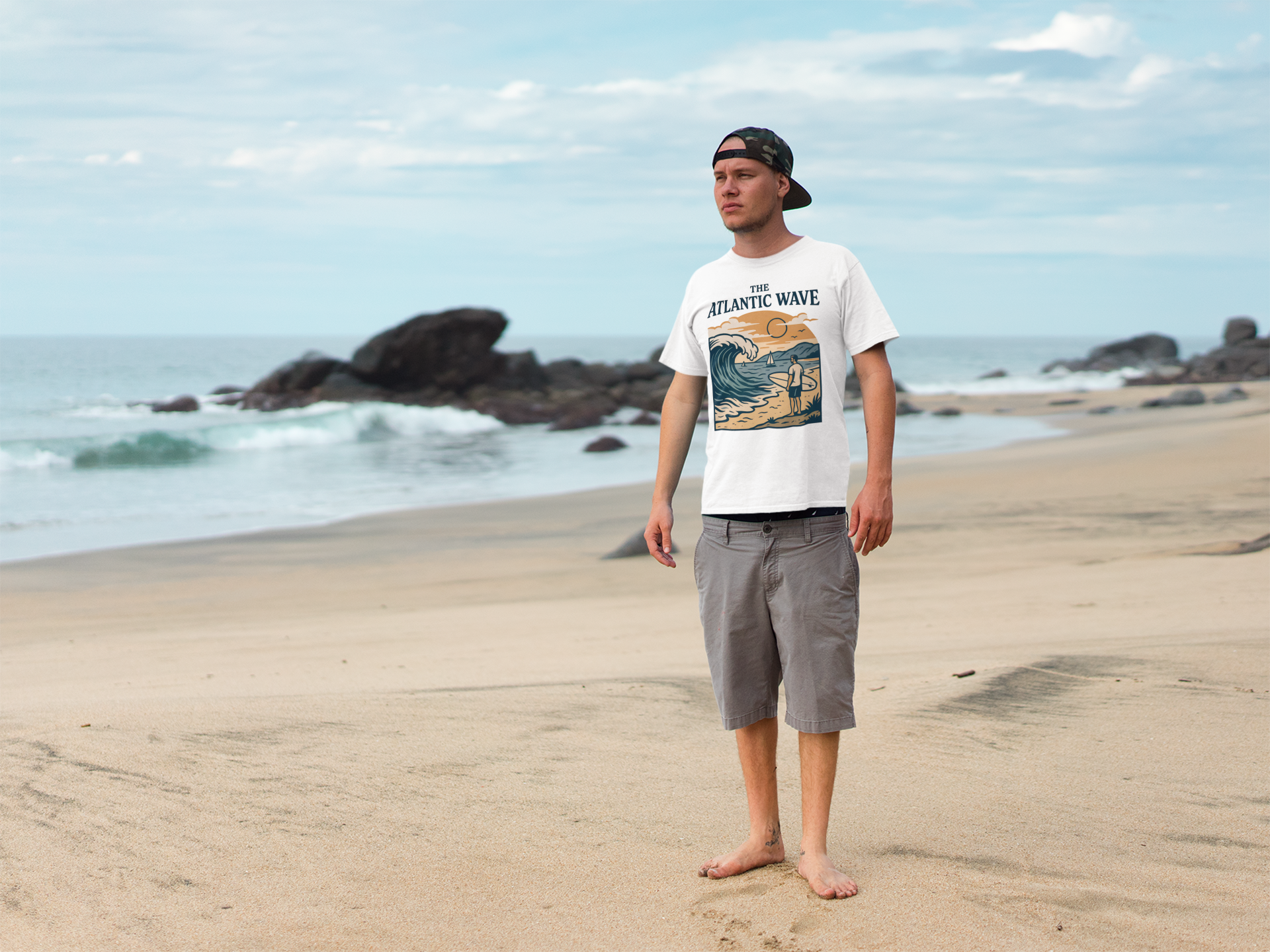 Folded shirt showing large bold surf design.