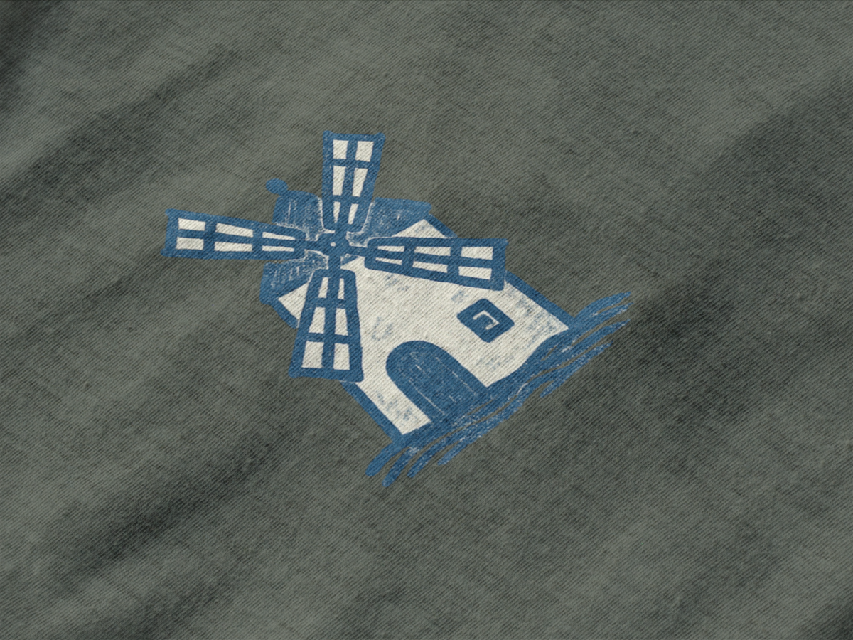 Minimalist windmill graphic t-shirt in organic cotton.