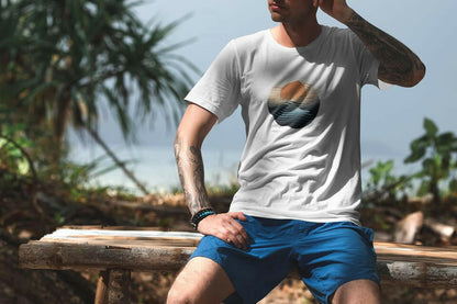 White Organic Surf Nazaré T-Shirt with a minimalist sunset and wave design. A lightweight, eco-friendly tee for beachgoers and adventurers.