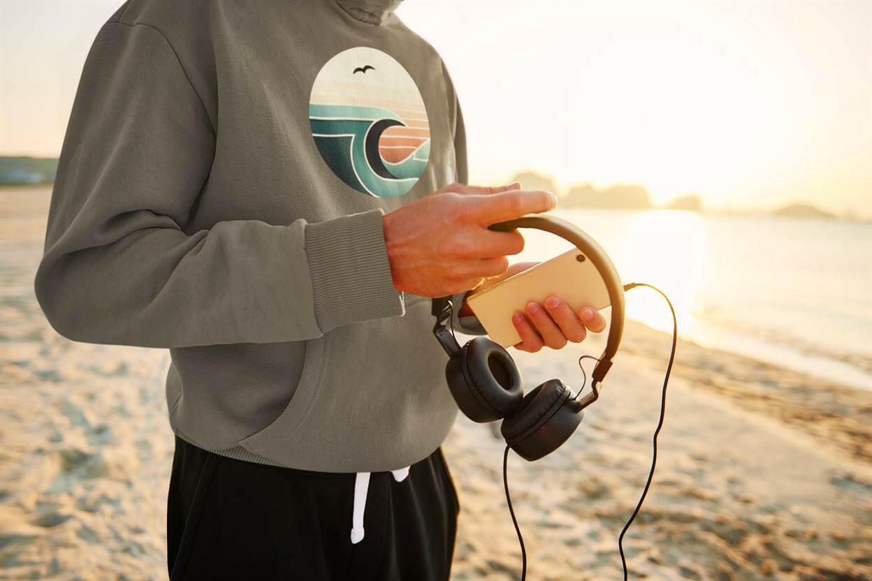Olive green Nazaré Surf Wave Hoodie featuring a retro wave and seagull print. Perfect for casual wear with organic comfort and eco-friendly fabric.