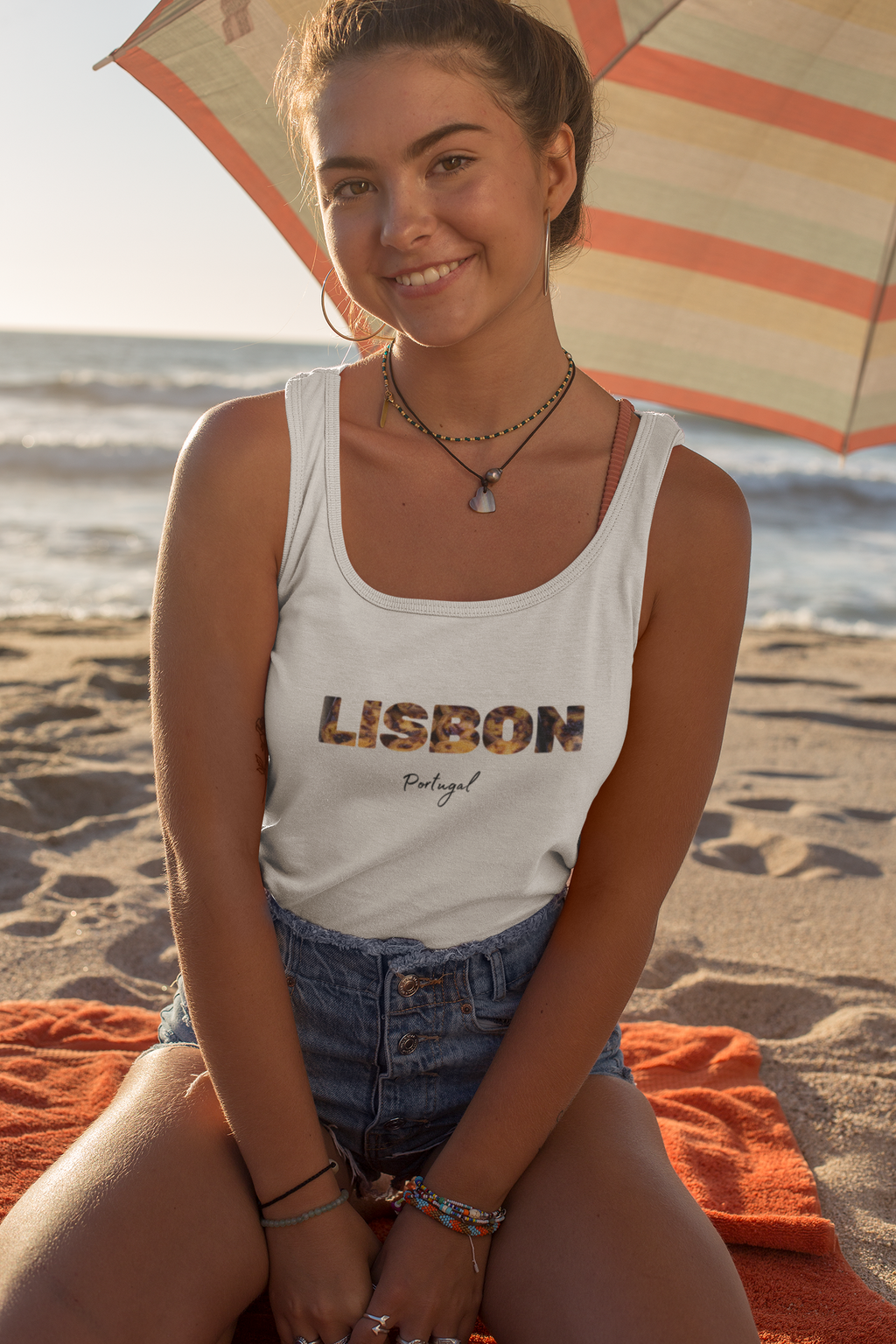 Close-up of the Large Lisbon Letters on a Women’s Organic Tank Top, highlighting cultural designs.