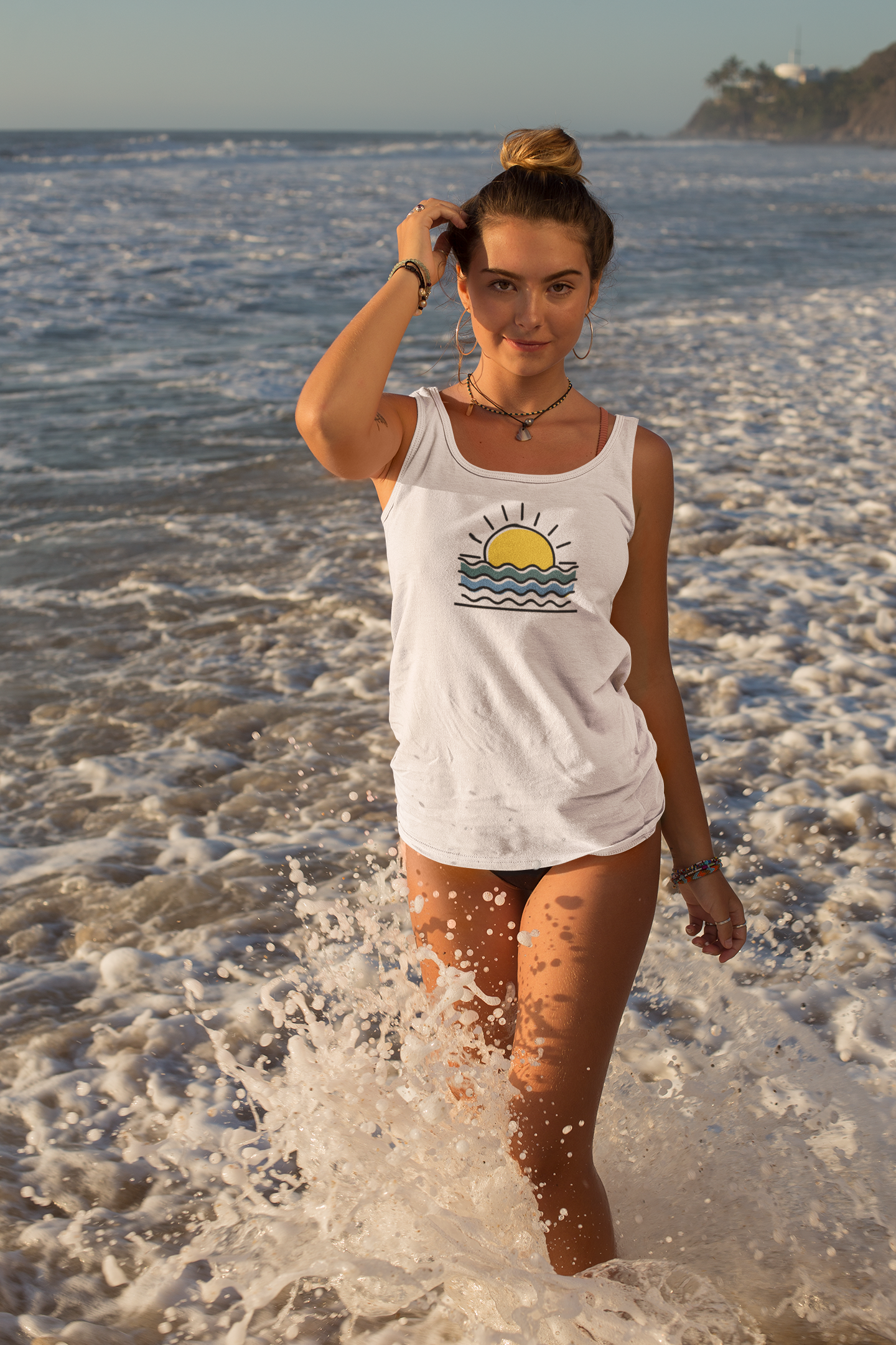 Model wearing the Sunset Over the Atlantic Tank Top, perfect for summer and beach days.