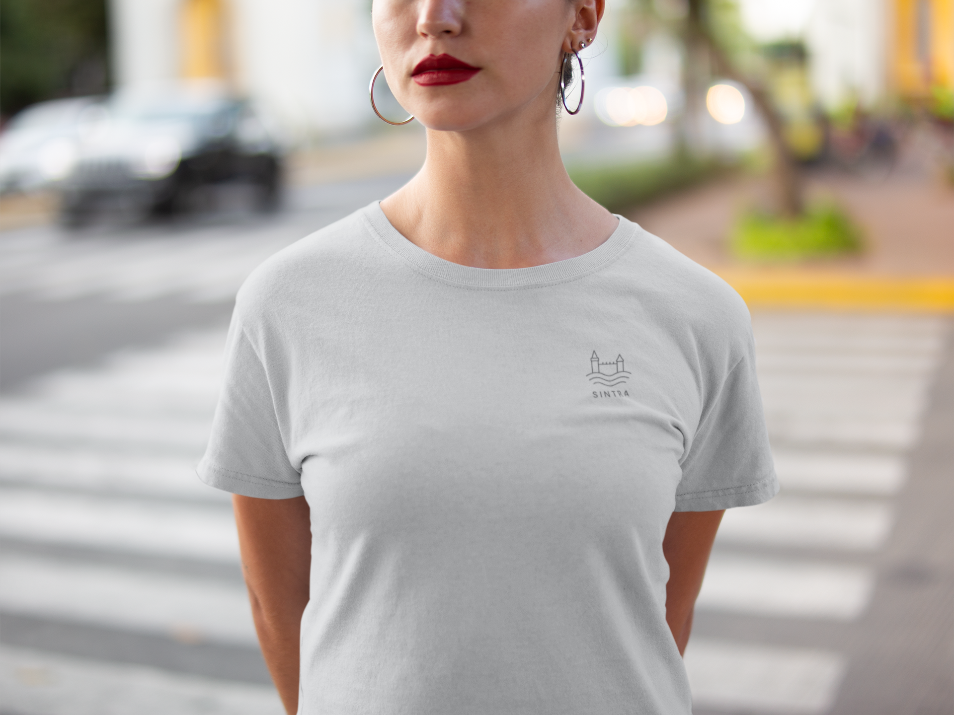 Unisex eco t-shirt with subtle Sintra icon.