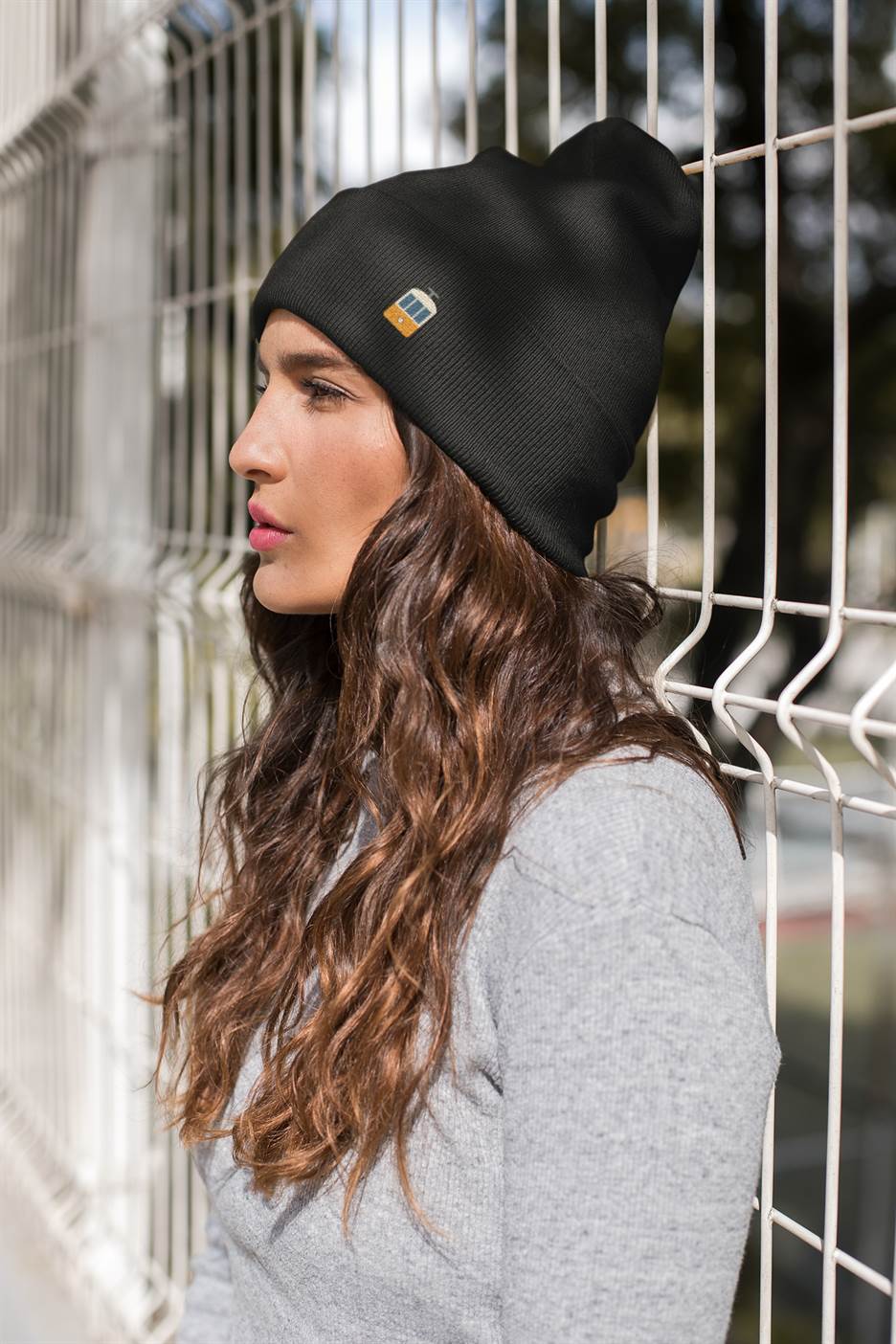 Black Lisbon Electrico Beanie with embroidered tram design, made from turbo acrylic. A stylish unisex accessory inspired by Lisbon's charm.