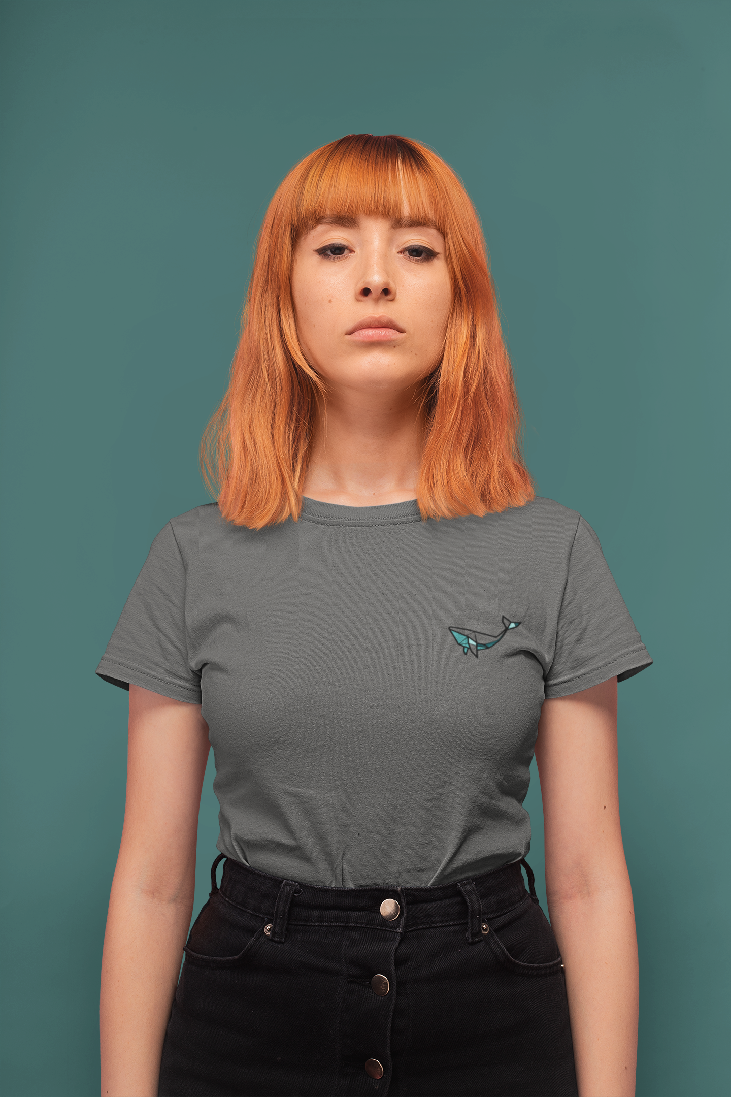 Close-up of the Minimal Whale Logo on soft organic cotton.