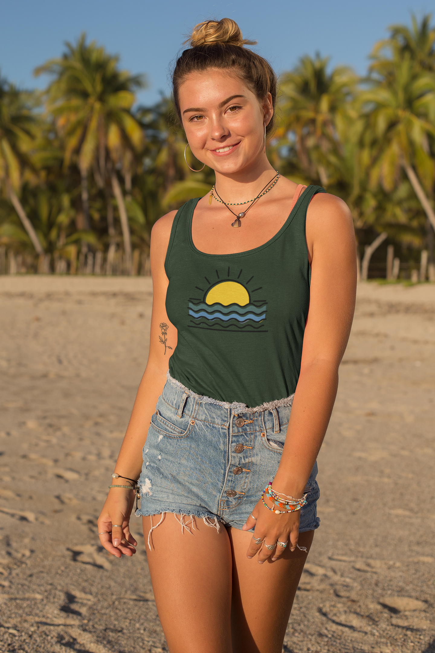 Side view of the Women’s Organic Sunset Over the Atlantic Tank Top, highlighting its relaxed fit.