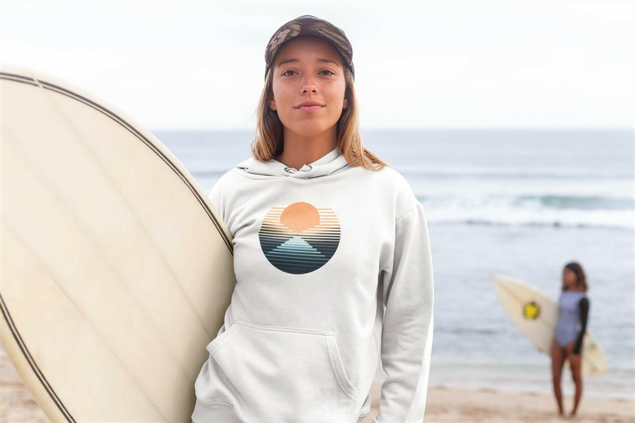 Unisex organic Nazaré vintage hoodie in light color, featuring a retro surf sunset design. Perfect eco-friendly apparel for beach lovers and surfers.
