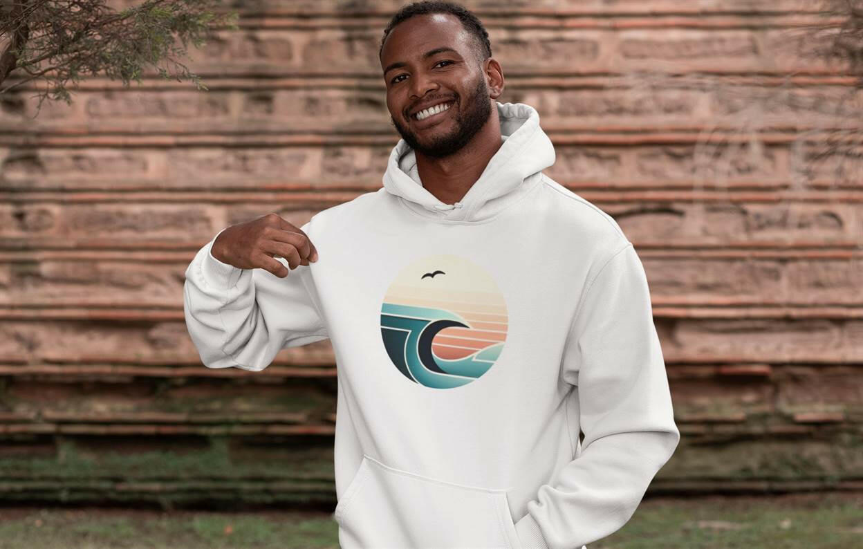 White Nazaré Surf Wave Hoodie with a bold wave and seagull print. Unisex organic hoodie offering comfort and a timeless surf aesthetic.