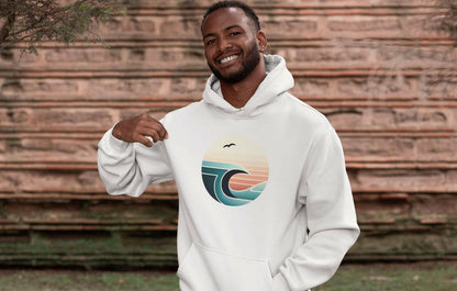 White Nazaré Surf Wave Hoodie with a bold wave and seagull print. Unisex organic hoodie offering comfort and a timeless surf aesthetic.