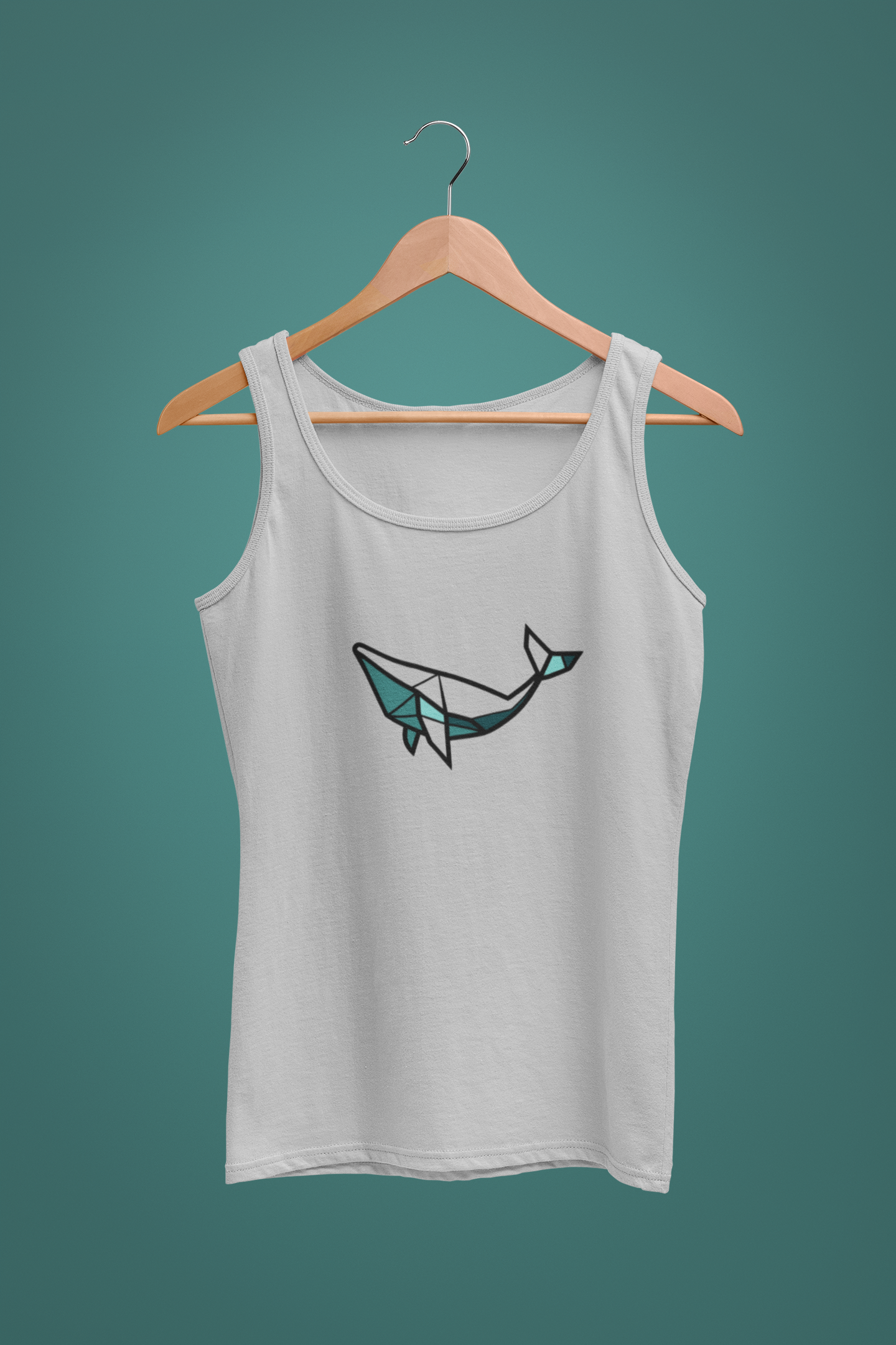 White tank top with a whale design on a hanger against a teal background