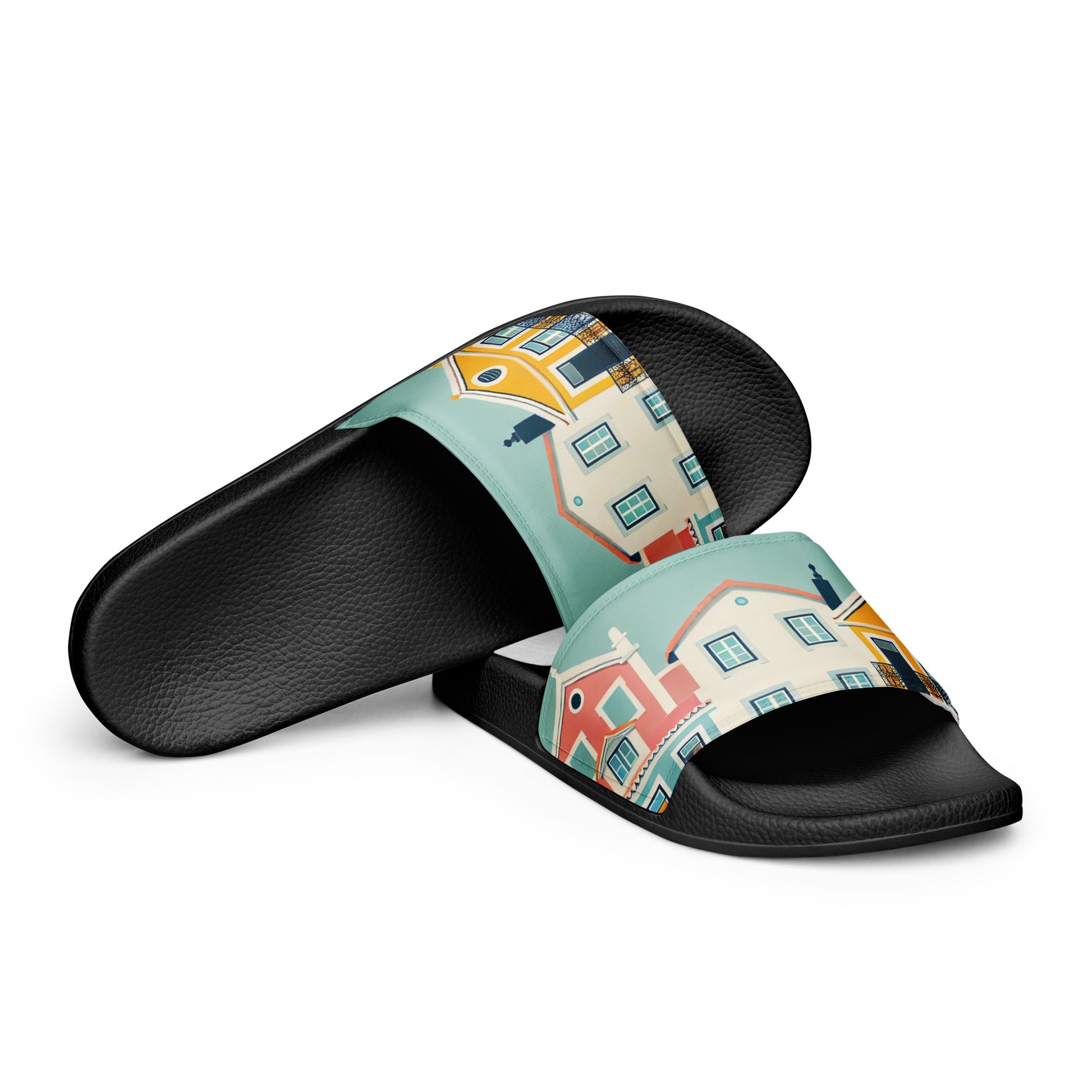 Side view of Alfama Woman Pool Slippers with a vibrant Portuguese house design on a black sole. Durable and stylish for casual outings.